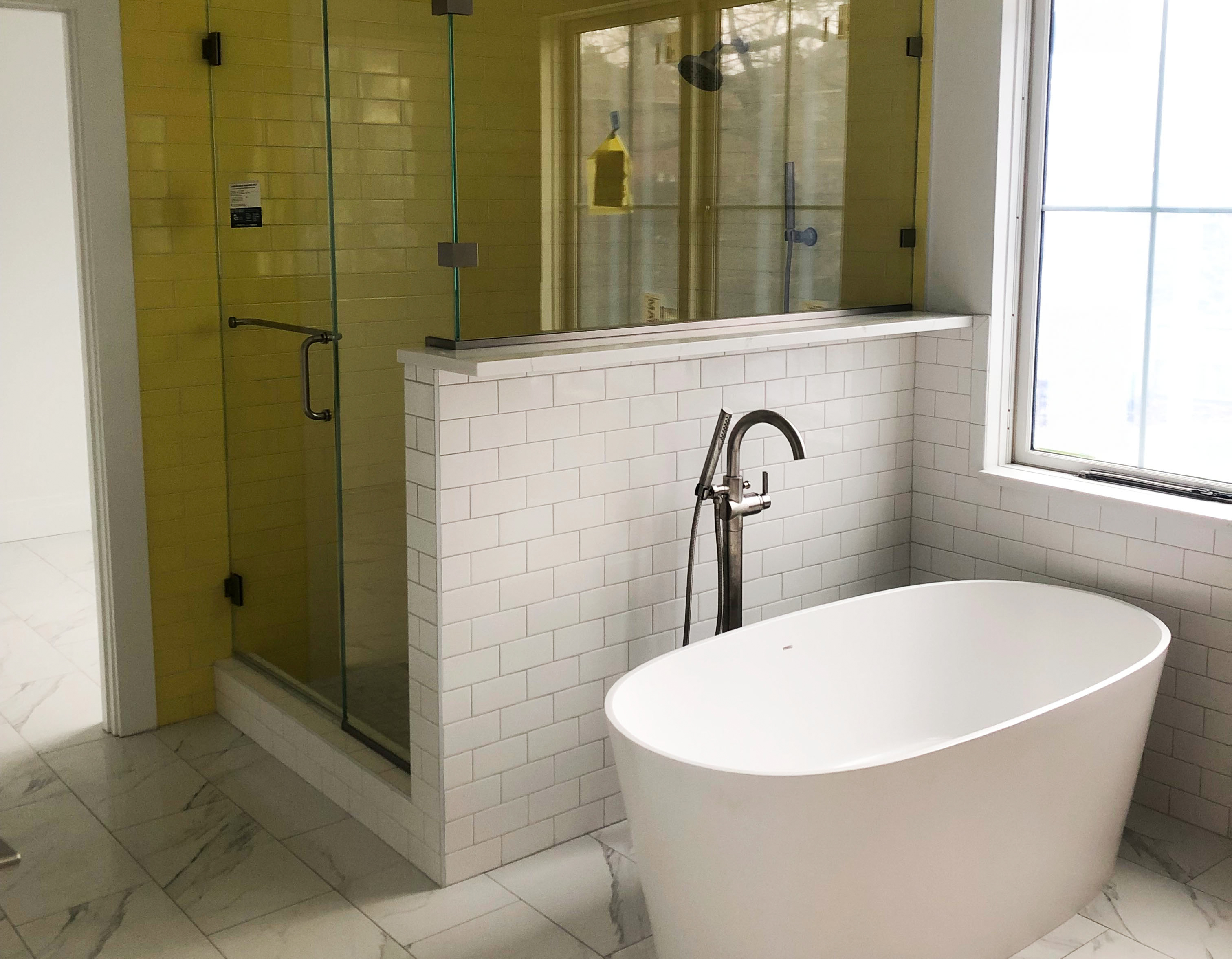 Main image of a recently renovated high-end bathroom.